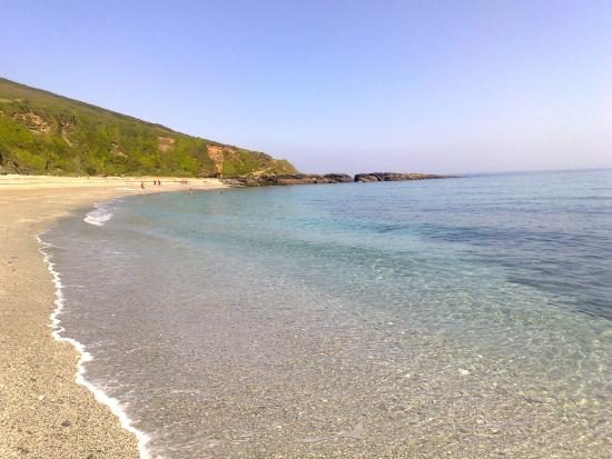 Vault beach, shingle and cliffs.